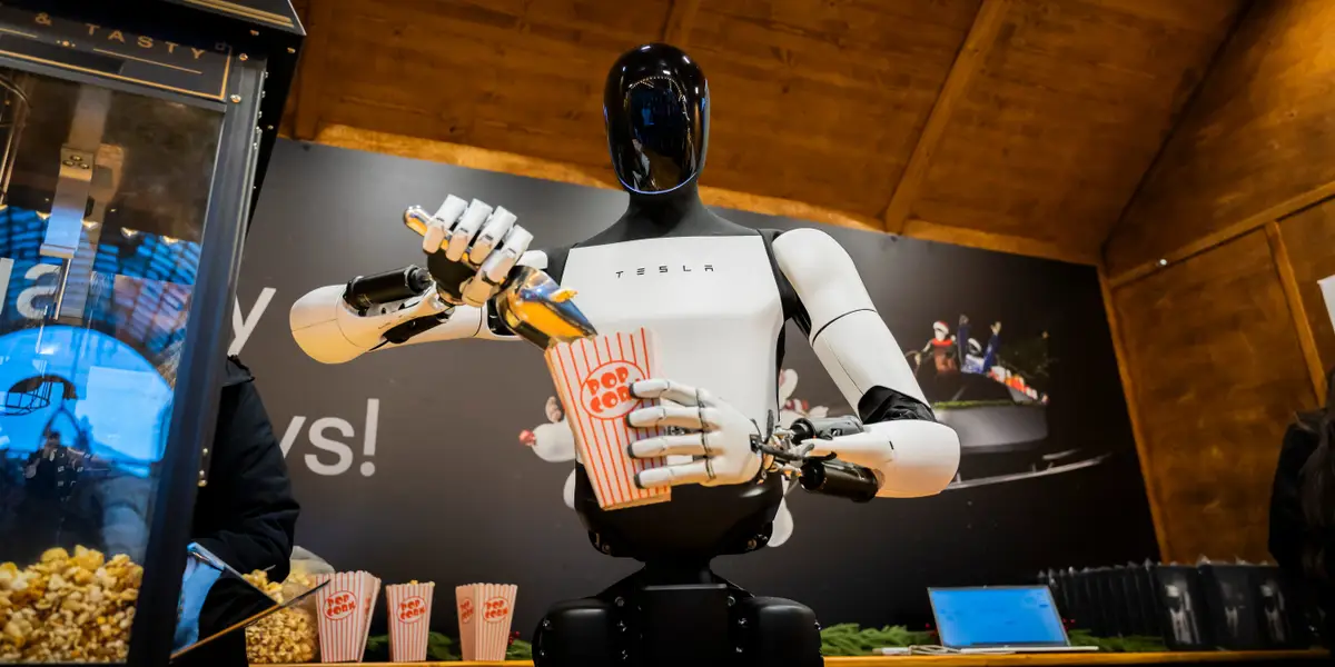 Elon Musk wrangles with the robot hand