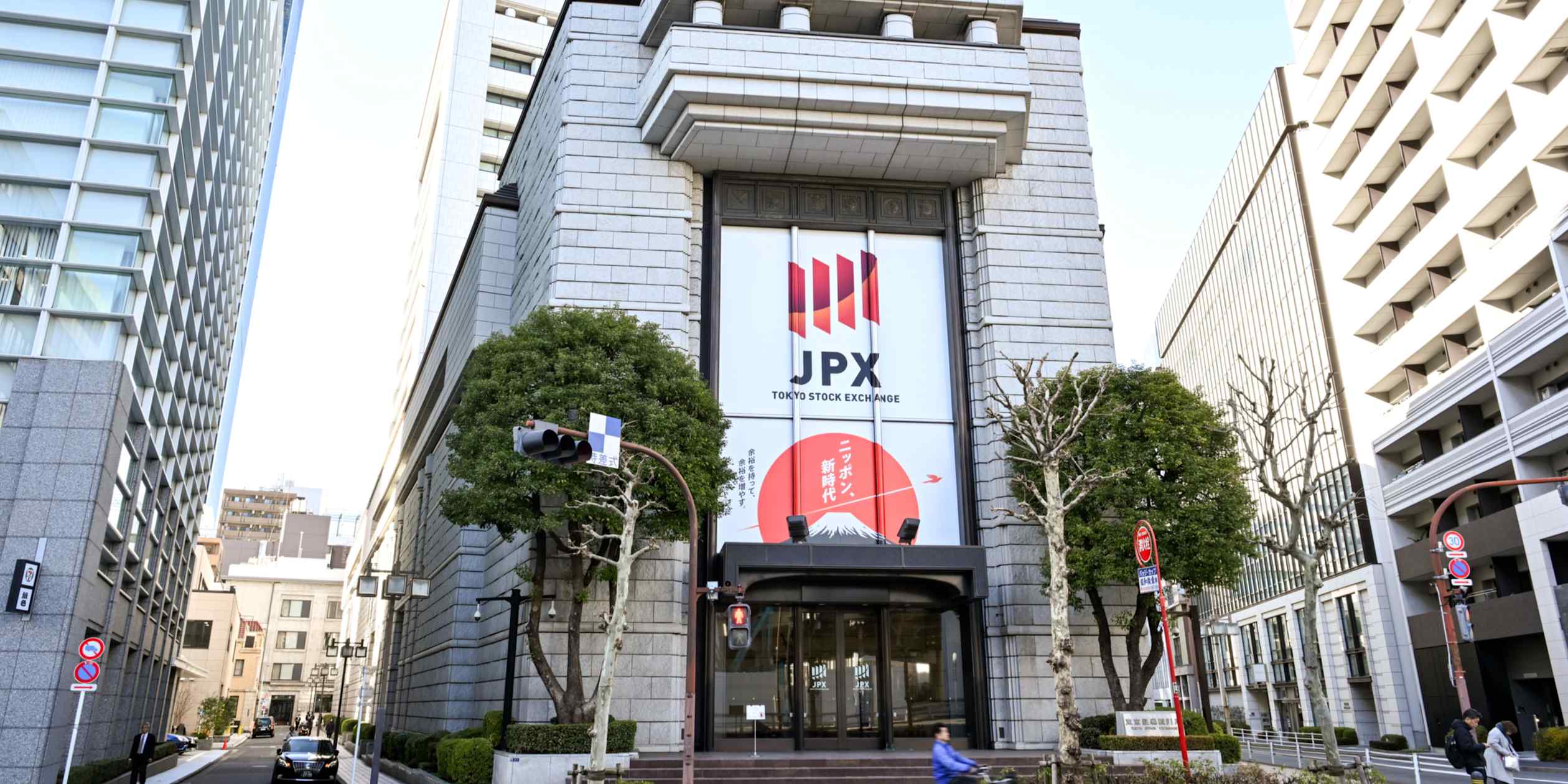 Japan's Nikkei average briefly regains 70,000 mark as AI optimism returns