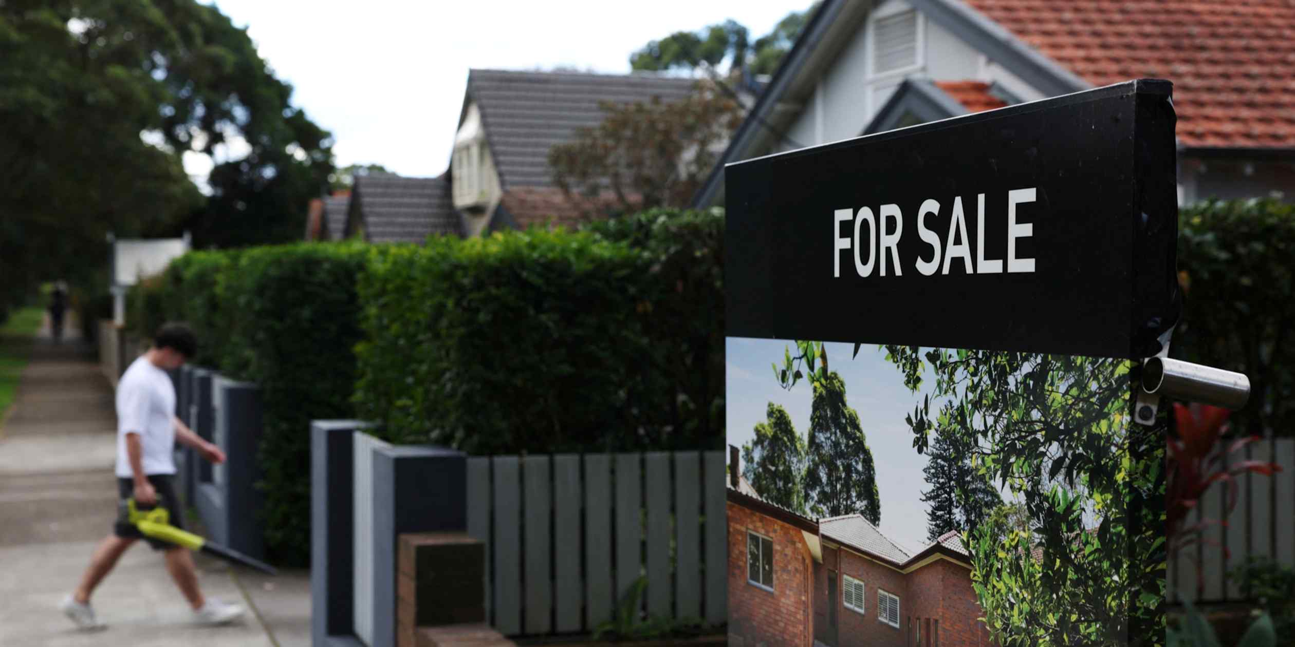 Australian home prices tumble as tax rules, rate hikes bite