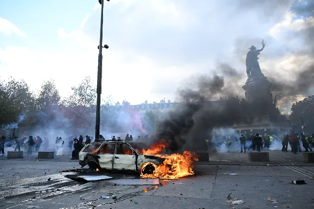 France Arrests 1,800 After Protests Injure 500 Officers and Torch Buildings